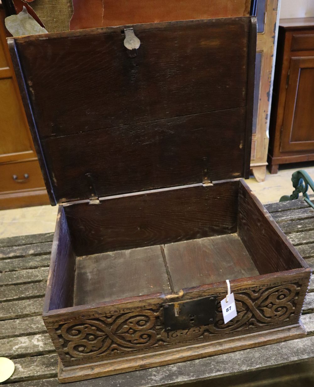 A 17th century carved oak bible box, width 63cm
